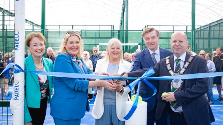 Sandi Procter cutting the ribbon on the padel court