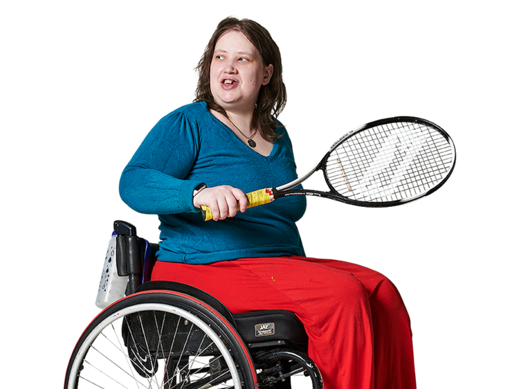 Woman in a wheelchair, with a tennis racket in her hand, looking over her shoulder