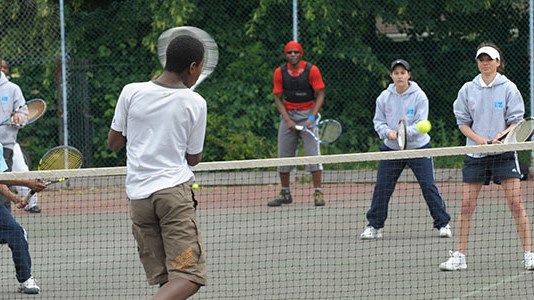 Tennis for free event at a local tennis court
