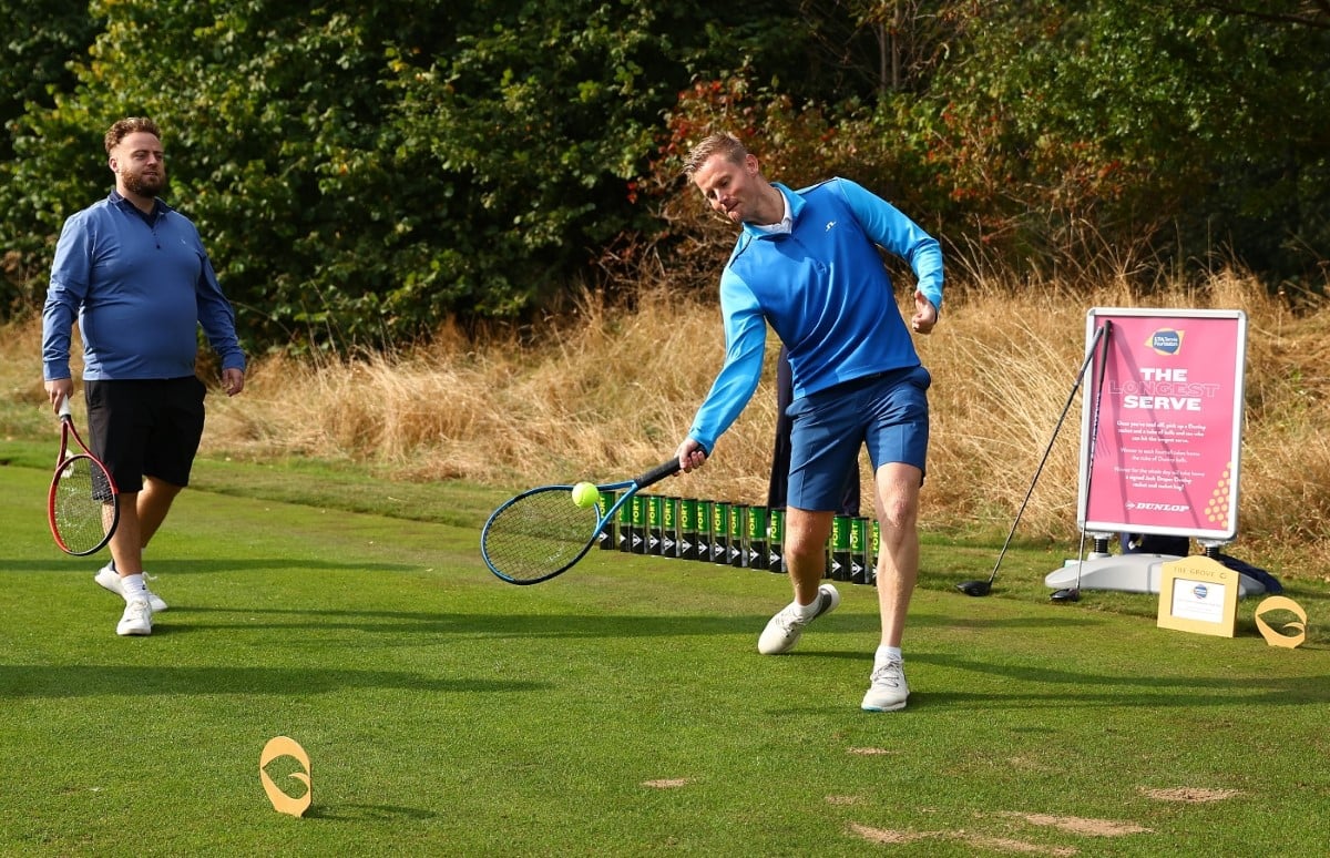 Man taking part in Longest Serve competition at LTA Tennis Foundation Golf Day 