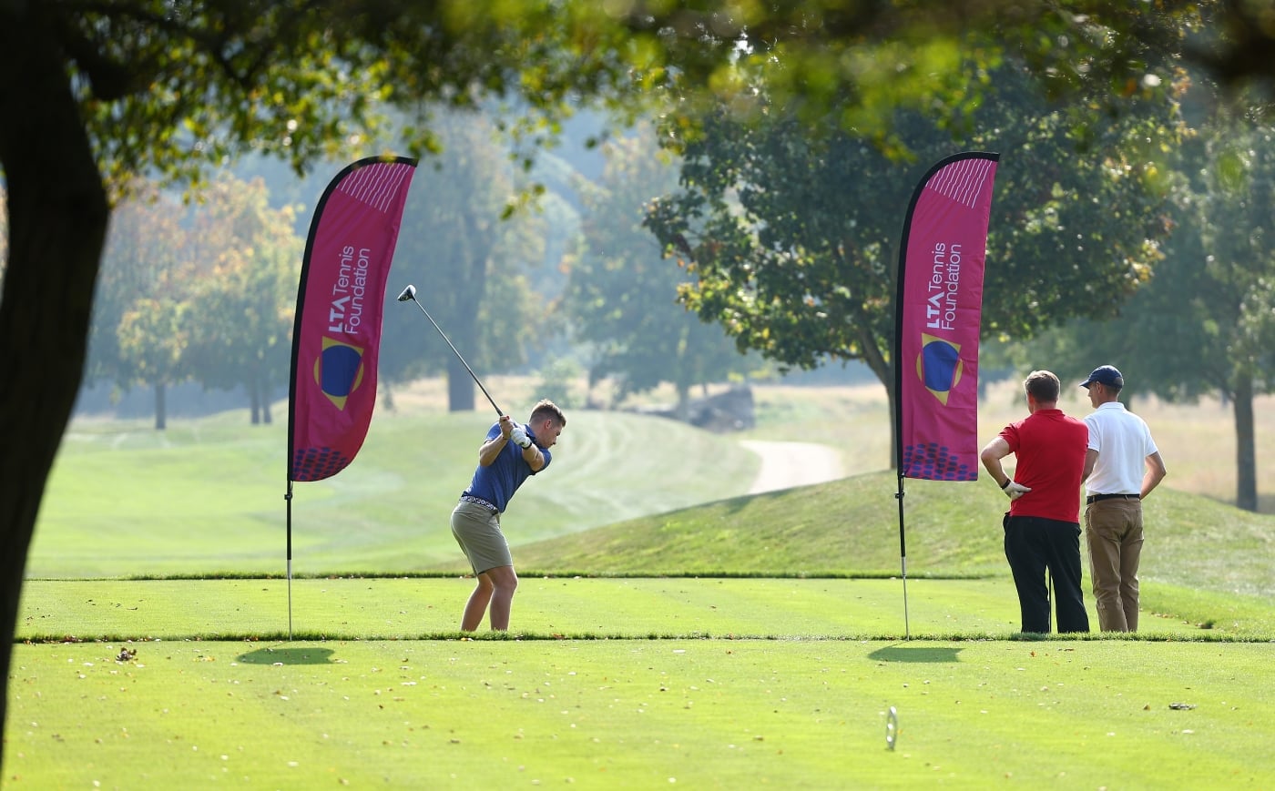 Neal Skupski teeing off at Hole 1 LTA Tennis Foundation Golf Day