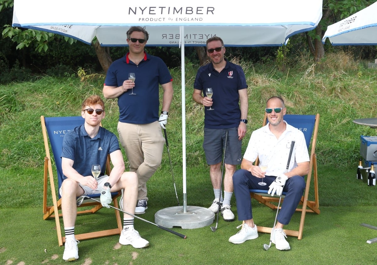 4 LTA Tennis Foundation golf day participants enjoying a glass on Nytimber 