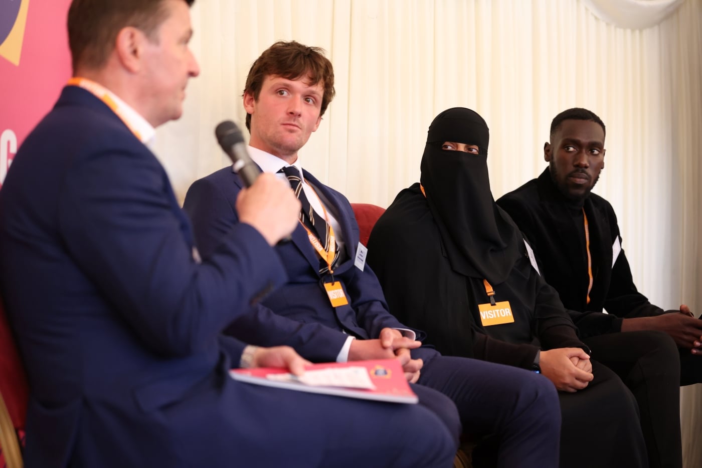 A panel of speakers at the reception