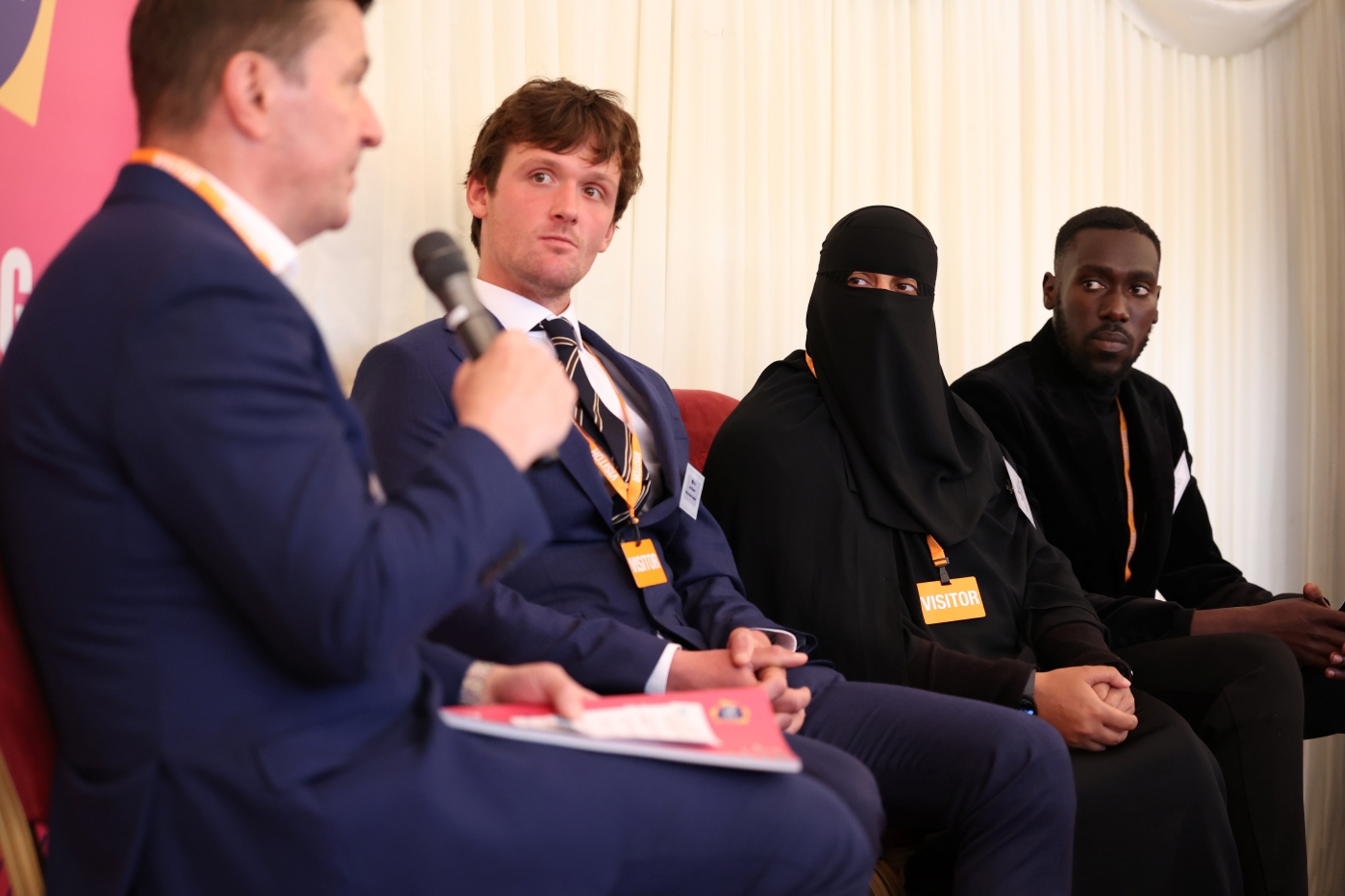 A panel of speakers at the reception