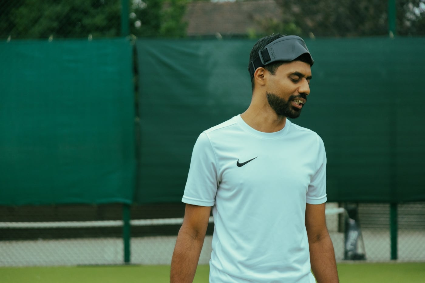 Visually impaired tennis player Naqi Rizvi on court